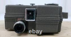 Cinemaster II Model G-8 8mm Film Cine Camera and Sylvania Sun Gun Movie Light